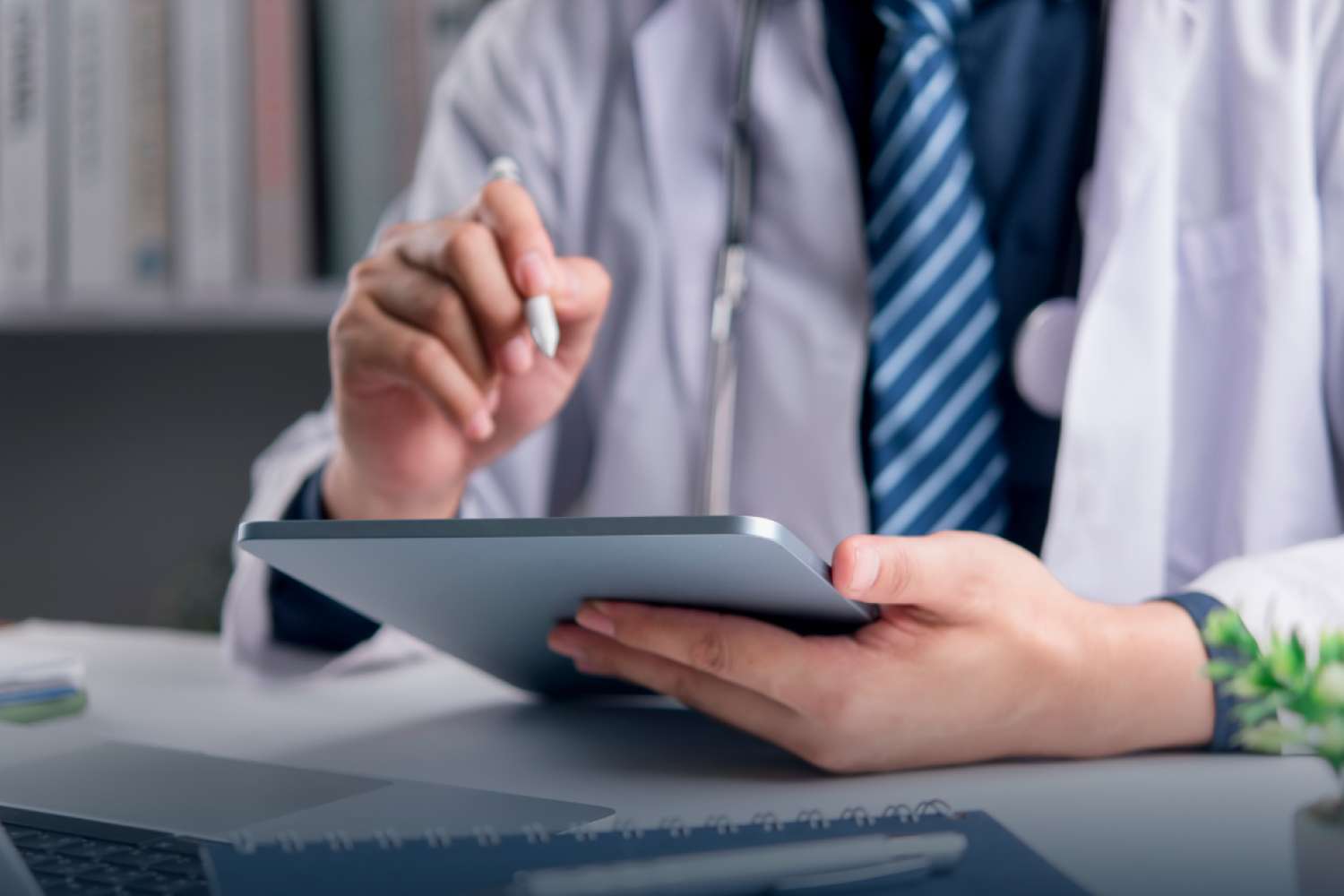 Healthcare professional using digital tools to deliver telehealth services